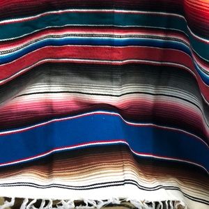 Beautiful bright m-colored Blanket made in Mexico.